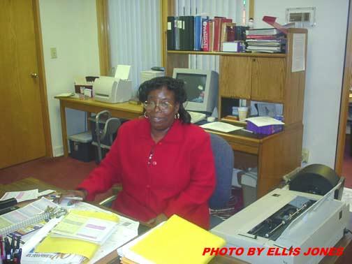 Photo taken Feb 26, 2002
 WITHOUT THIS LADY, NO ORDER.